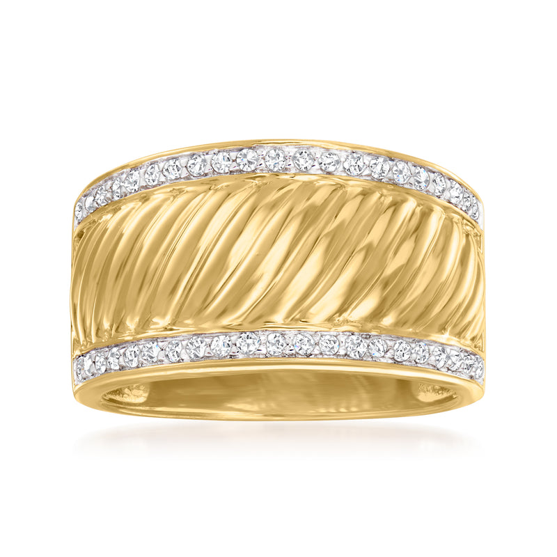 Gold-tone ridged band ring with clear stones set along the top and bottom edges