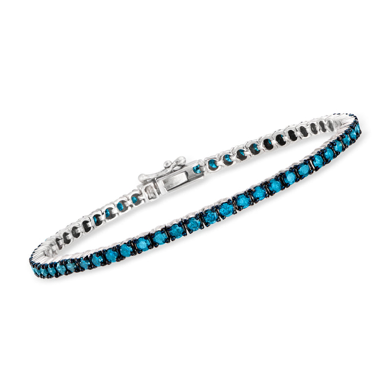 Blue gemstone tennis bracelet in 14kt white gold, row of blue stones with prongs