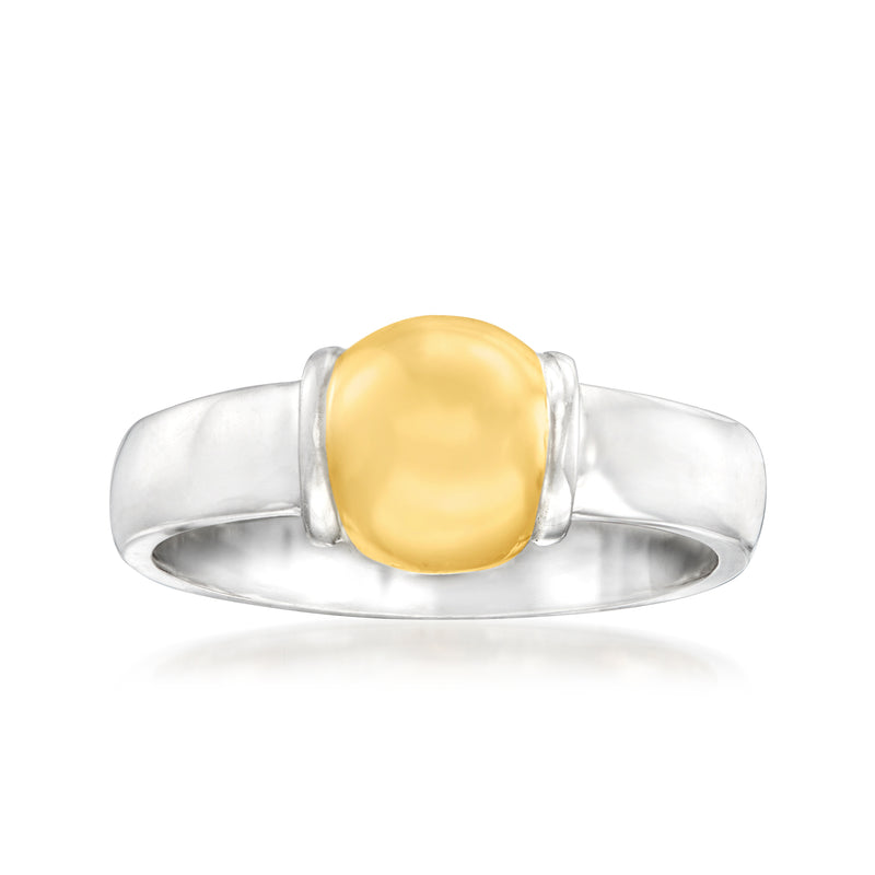 Sterling silver ring with oval yellow gold center bezel