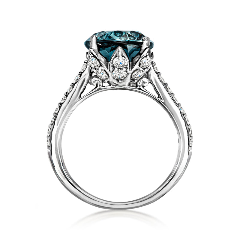 Oval London blue topaz ring with diamond halo details in 18kt white gold, prong set