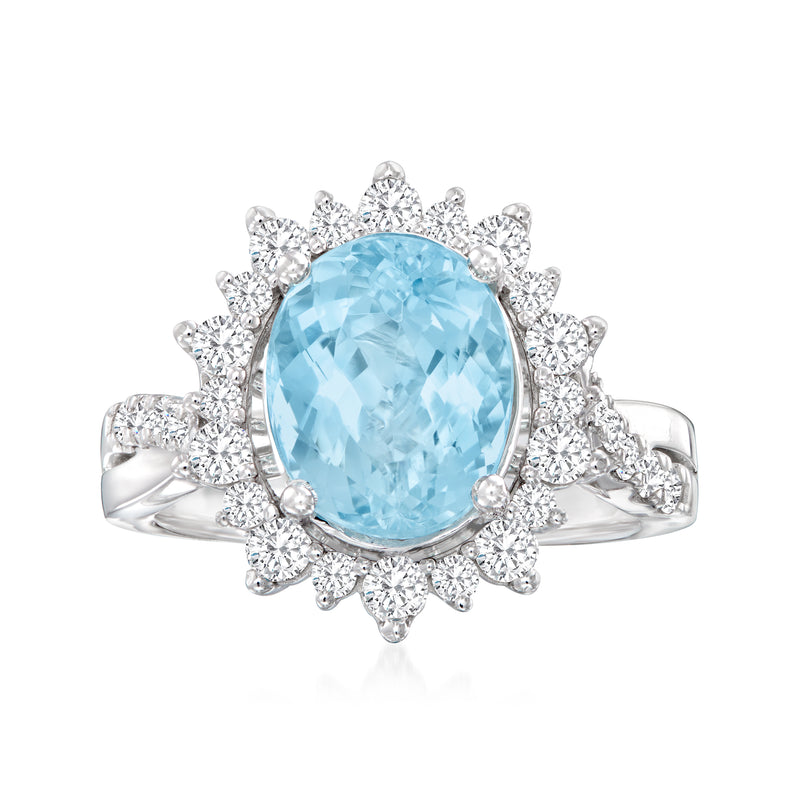 Oval aquamarine gemstone halo diamond ring in 18k white gold, floral setting