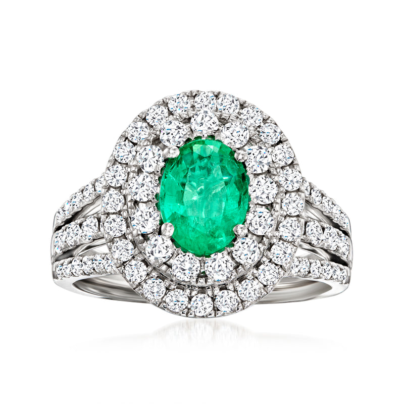Emerald-cut green emerald and diamond halo ring in 18kt white gold