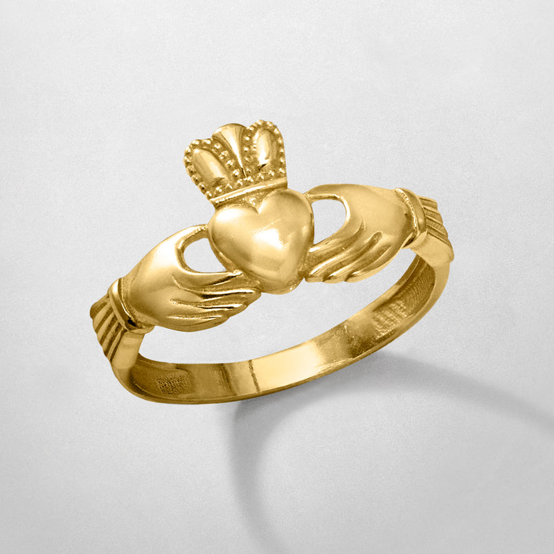 14kt yellow gold claddagh ring angled view, heart centerpiece and clasped hands
