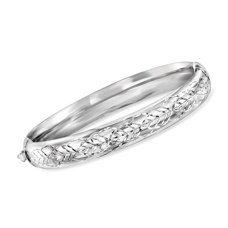 Sterling silver bangle bracelet with leaf-pattern textured band, hinged clasp