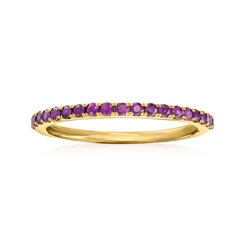 14kt yellow gold amethyst ring with prong-set round purple stones along the band