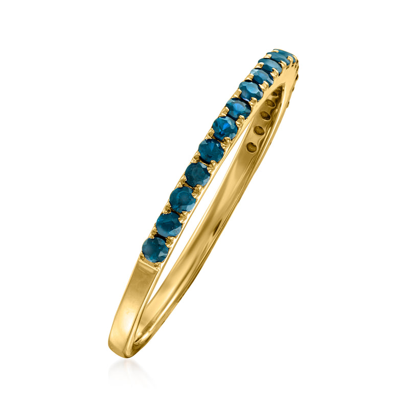 14kt yellow gold ring with London blue topaz line of stones, raised bezel