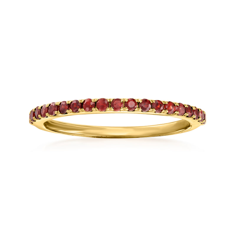 14kt yellow gold garnet eternity band ring with round garnet stones along the top