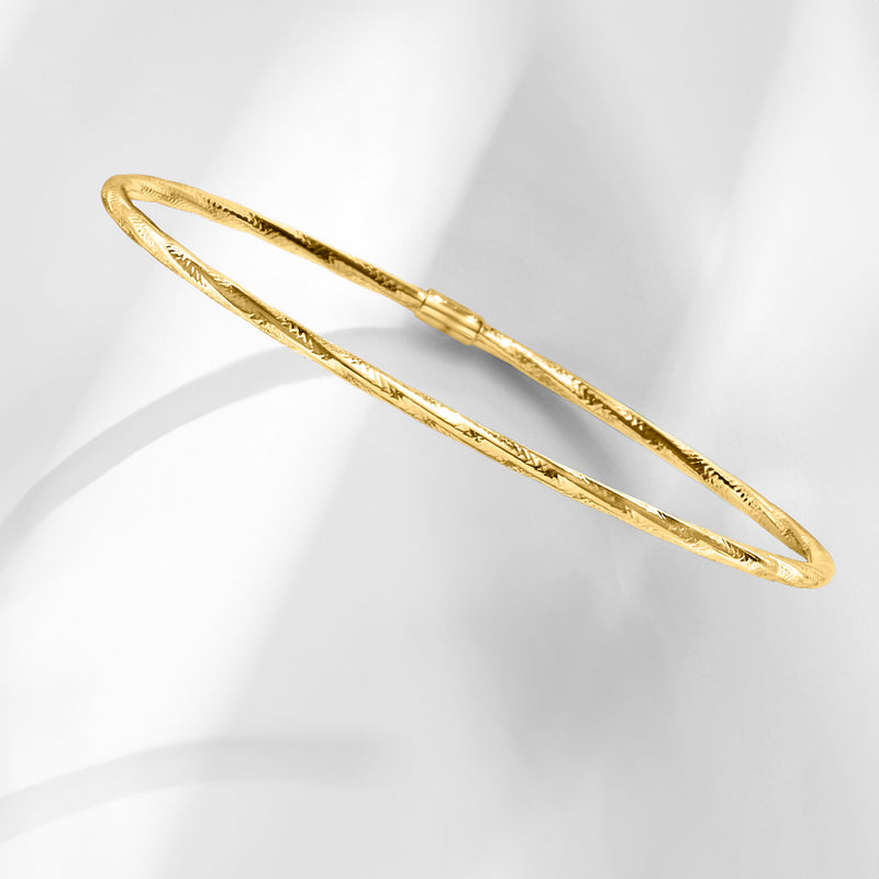 10kt yellow gold bangle bracelet, oval shape with hammered texture finish