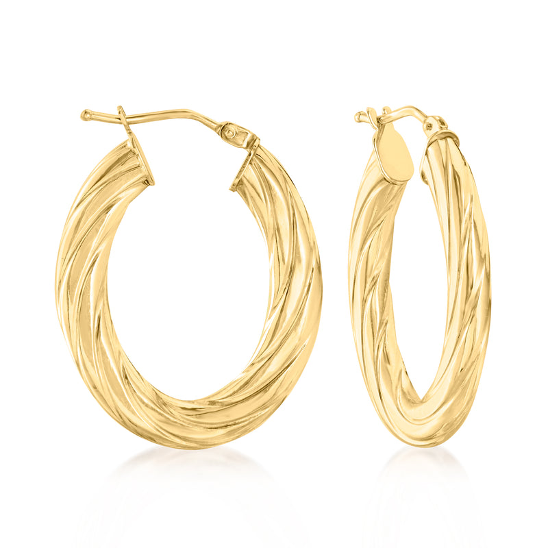 Italian 10kt yellow gold twisted oval hoop earrings with hinged clasp.