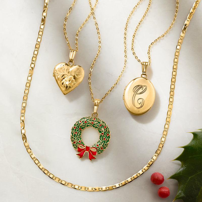 10kt yellow gold heart locket pendant necklace in view with other charms
