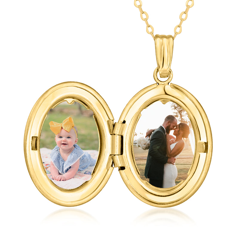 Opened yellow gold oval locket necklace holding two photo inserts on chain