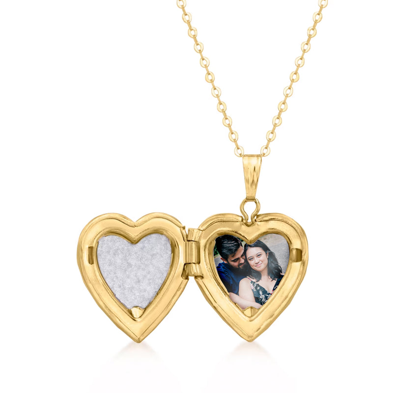 Two-tone gold heart locket with photo window and blank heart, on chain