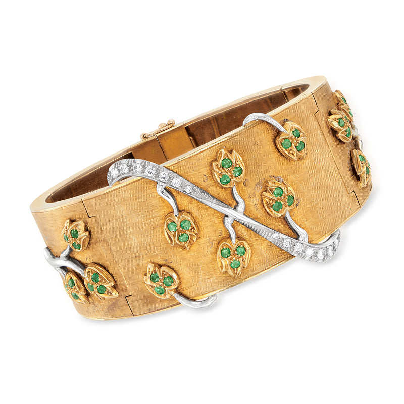 Vintage 18kt yellow gold bangle bracelet with green emerald accents and diamond details