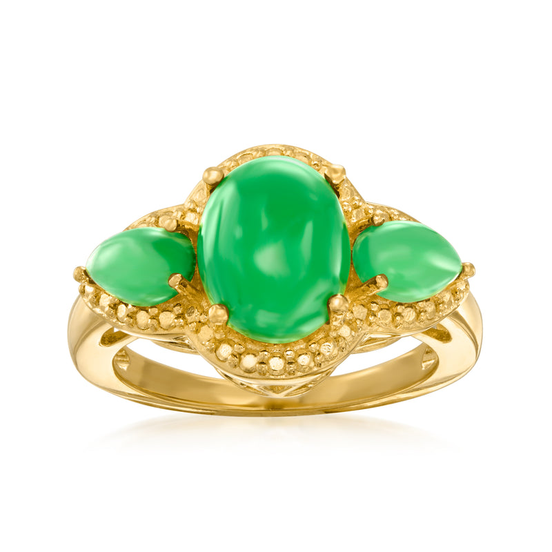 Three-stone jade ring with oval green gemstones in gold-tone setting