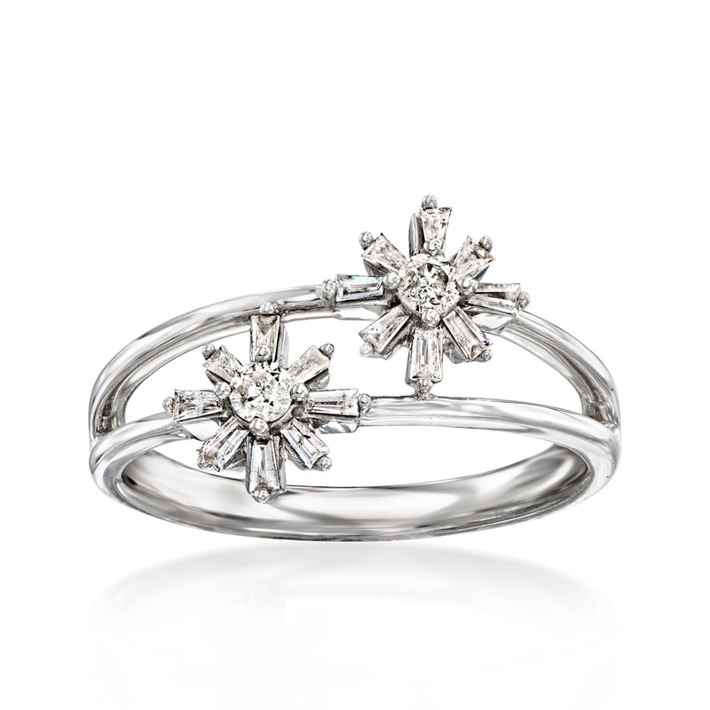 Sterling silver diamond flower ring with round and baguette-style stones in starburst settings