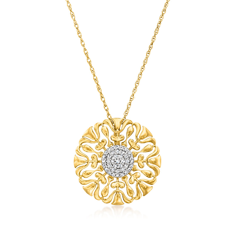 Gold medallion pendant necklace with ornate filigree and round diamond-look center