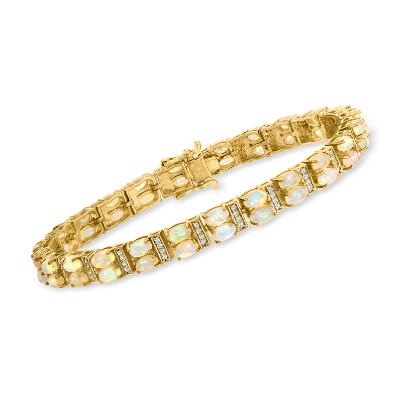 Gold-tone tennis bracelet with iridescent opal and clear white stones in square settings