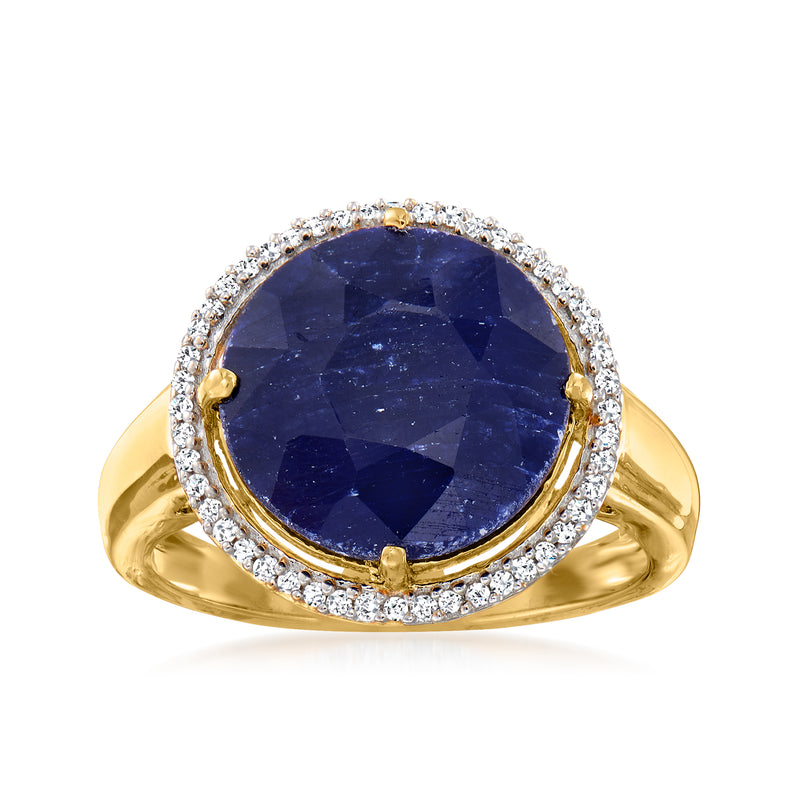 Round blue sapphire and diamond halo ring in yellow gold, prong-set