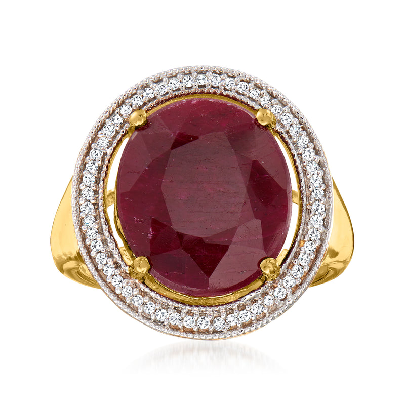 Gold-tone ruby ring with round ruby center and diamond halo, split shank
