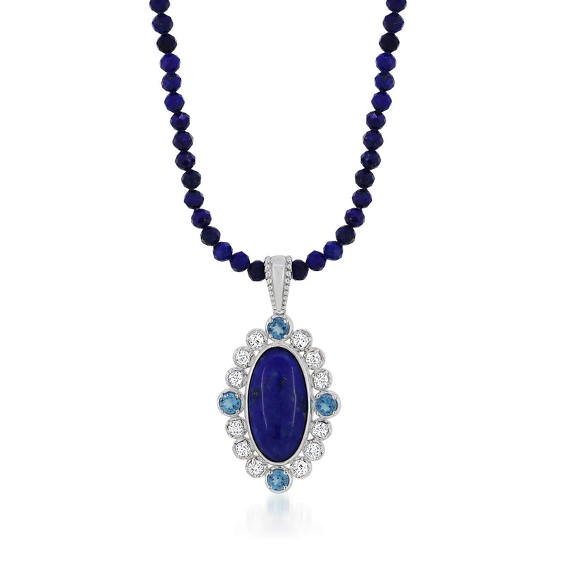 Sterling silver pendant necklace with deep blue oval stone and round clear accents