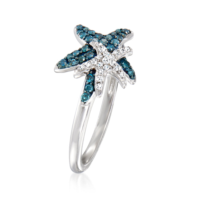 Sterling silver starfish ring with blue diamond accents and openwork star, side view