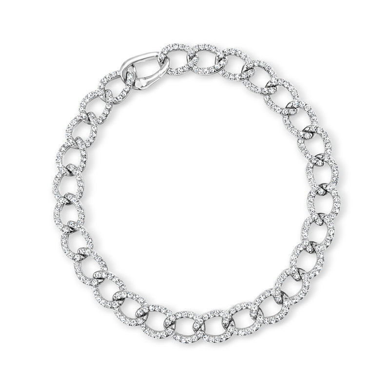 14kt white gold diamond curb-link bracelet with oval settings and round stones