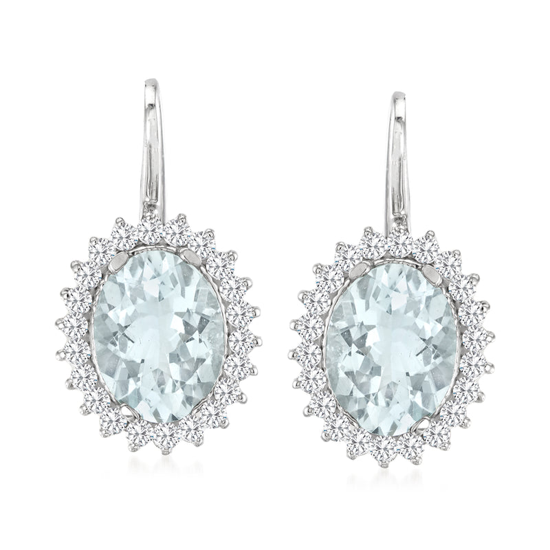14kt white gold drop earrings with oval aquamarine center and diamond halo