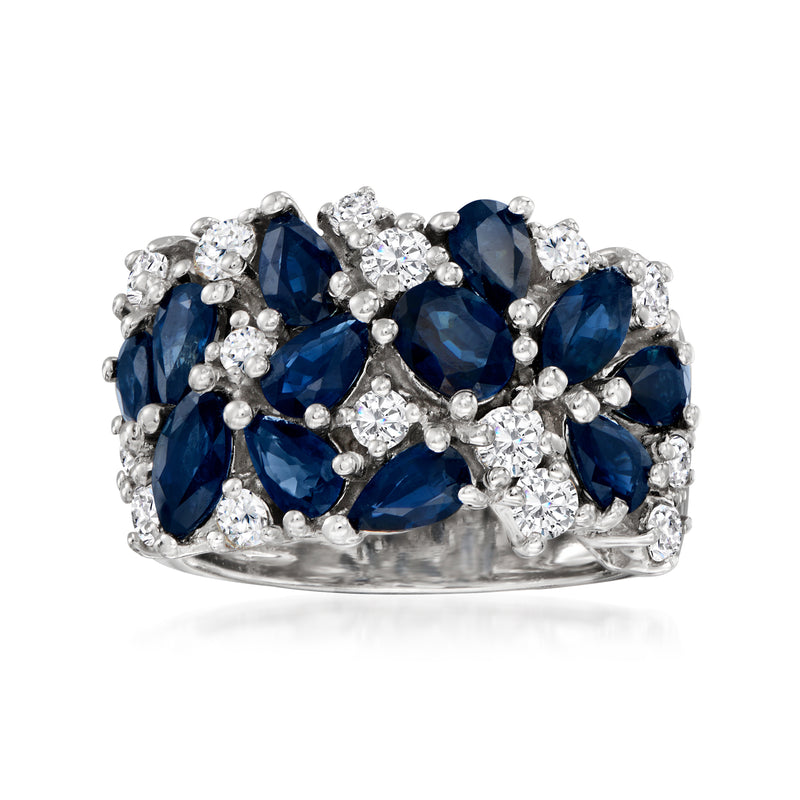 14kt white gold ring with oval deep blue sapphires and round diamond accents
