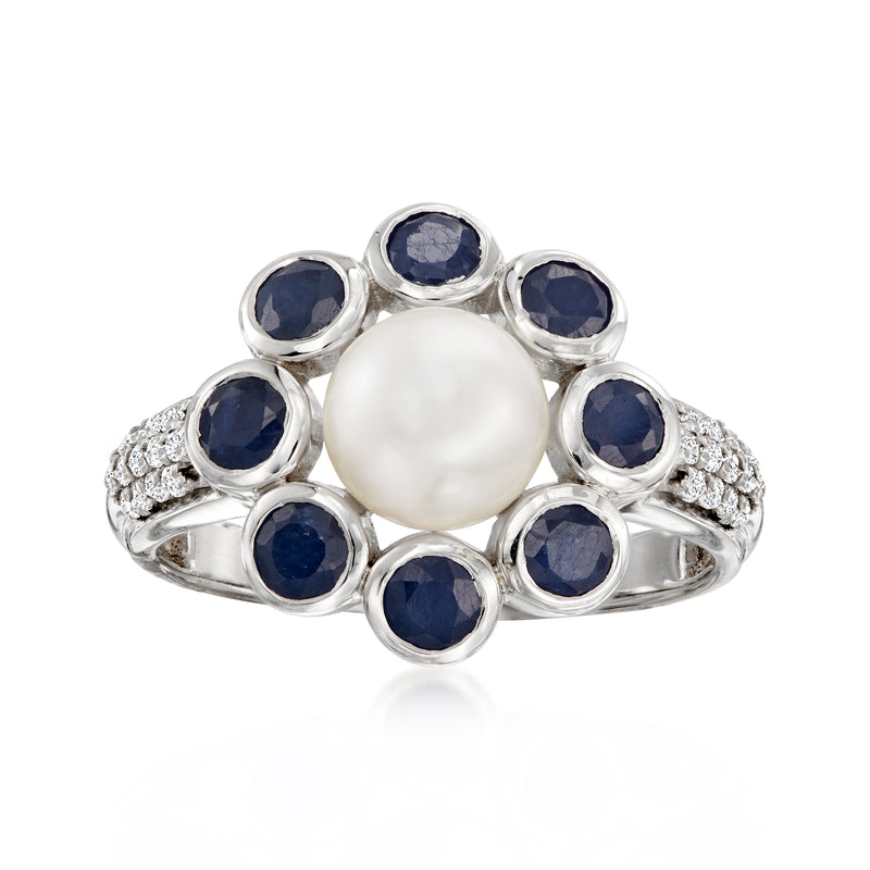 Sterling silver flower ring with round white cultured pearl and dark blue sapphire stones