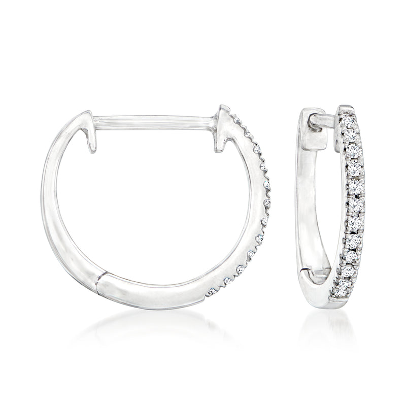 Platinum huggie hoop earrings with diamond accents, shown front and side view