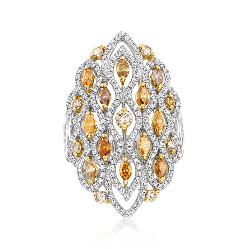 Two-tone gold diamond ring with oval yellow and clear stones in an ornate cluster design