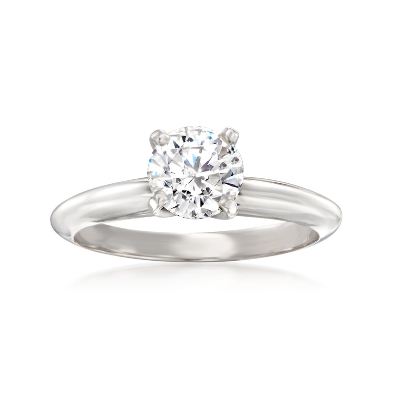 14kt white gold solitaire diamond ring with round brilliant center stone, four prongs