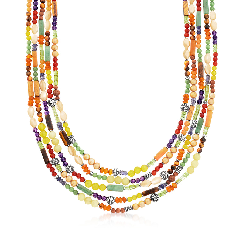 Multi-strand multi-gemstone bead necklace with sterling silver spacers, colorful beads.