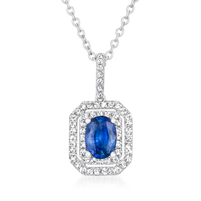 Platinum pendant necklace with oval cornflower sapphire and diamond halo