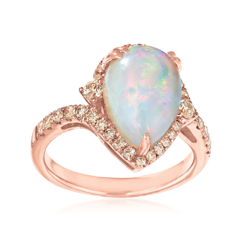 Rose gold opal ring with oval opal center and sparkling side stones, halo setting