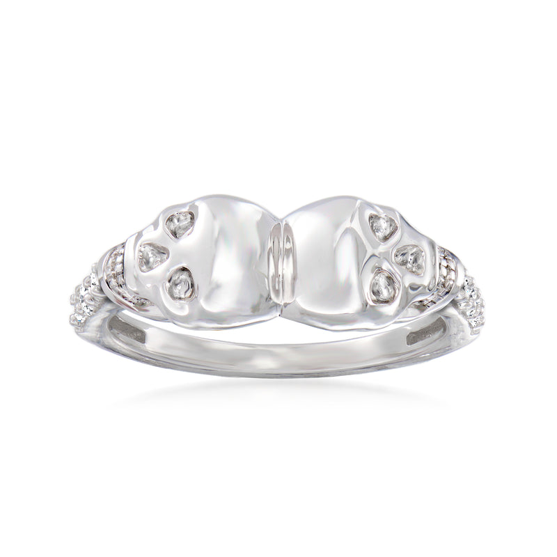Sterling silver double skull ring with small round diamond accents