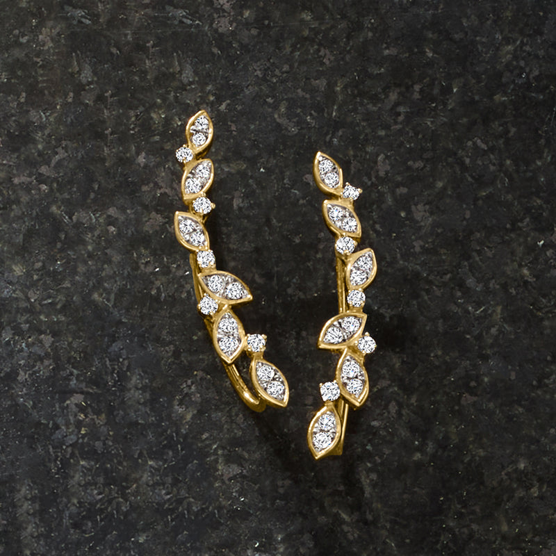 14kt yellow gold diamond leaf ear climber earrings with marquise stones on curved design