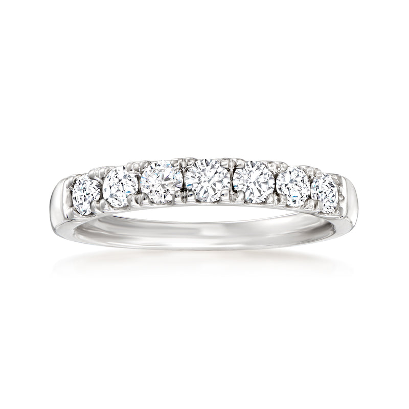 Platinum diamond band ring with multiple round stones across the top