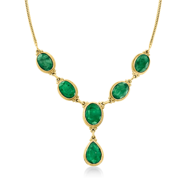 Gold Y-necklace with oval green gemstones in teardrop settings