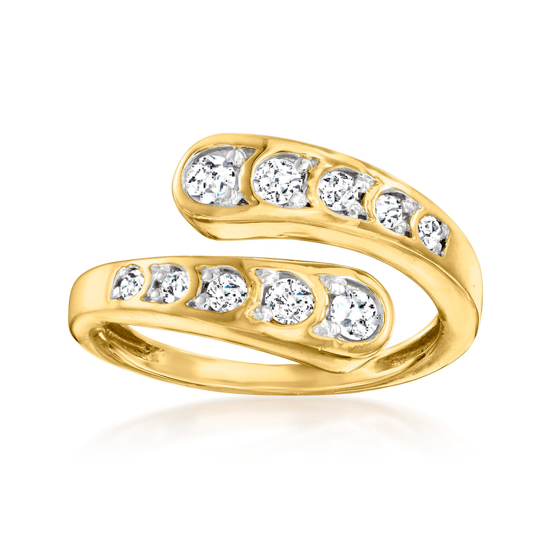 18kt gold over sterling bypass ring with scalloped edges and round diamond accents
