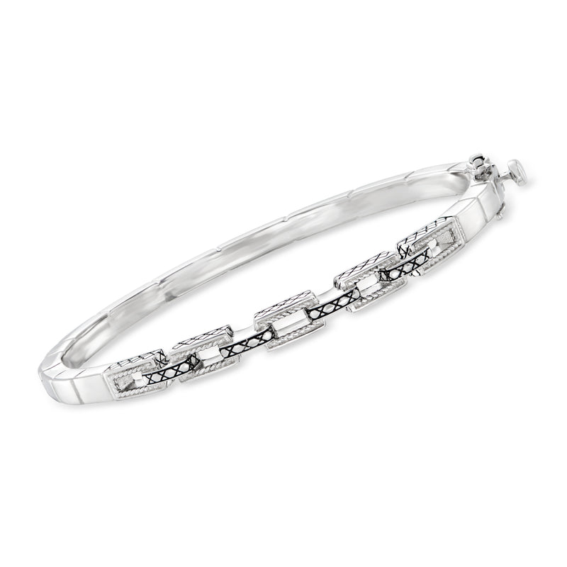 Sterling silver link bangle bracelet with patterned central panels and black accents