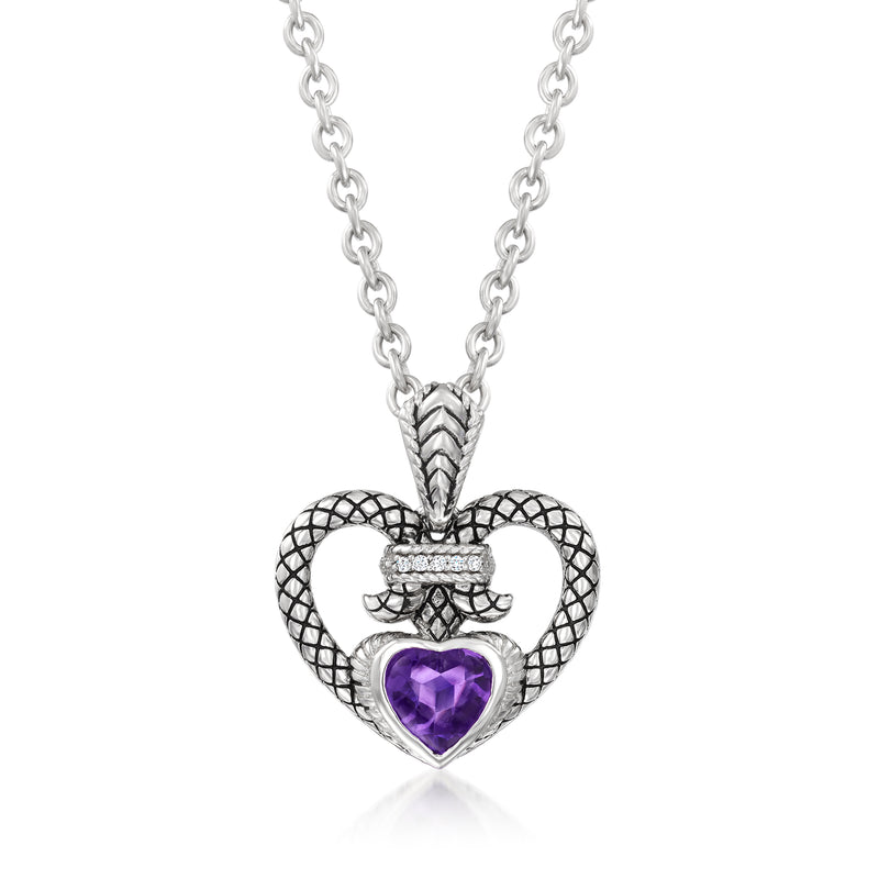 Sterling silver heart pendant necklace with amethyst center and diamond-like accents