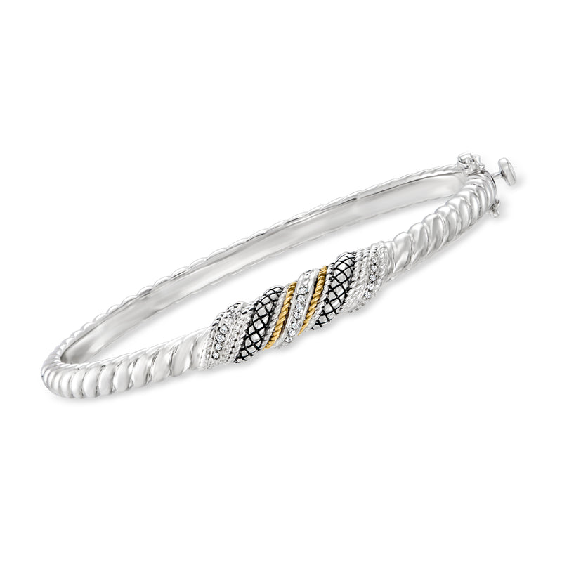 Sterling silver bangle bracelet with diamond accents and 18kt yellow gold center detail