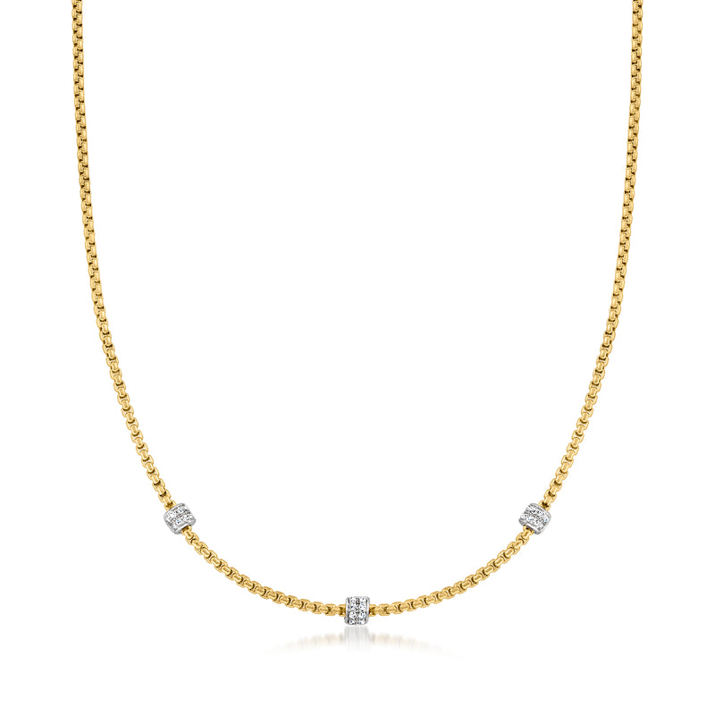 Yellow gold-tone chain necklace with small diamond stations in white metal