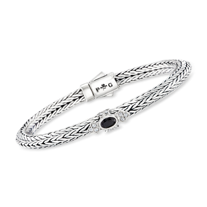 Sterling silver woven bracelet with black onyx and white sapphire accents