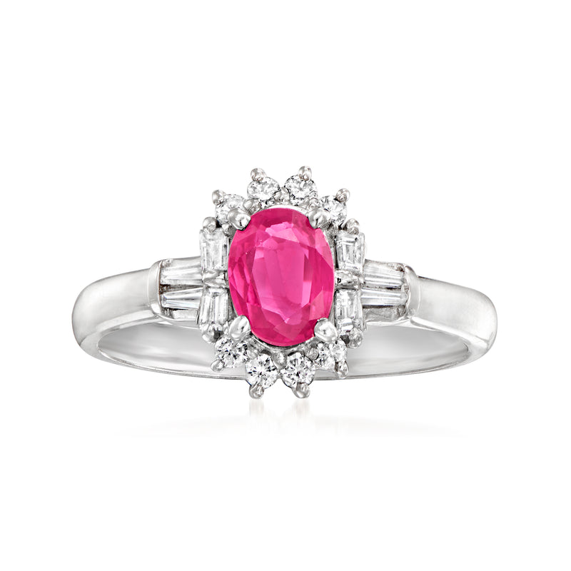 Vintage oval ruby and diamond halo ring in platinum with diamond accents