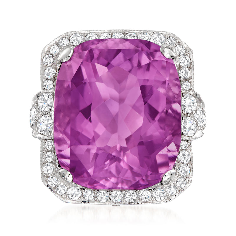 Cushion-cut amethyst ring in 18kt white gold with diamond halo and side stones