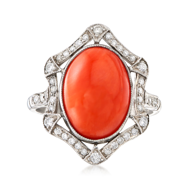 Vintage red coral oval ring with diamond halo and split shank, platinum look