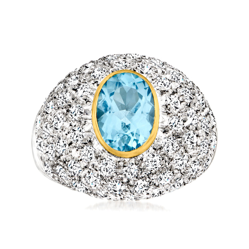 Vintage diamond dome ring with oval blue topaz in white gold