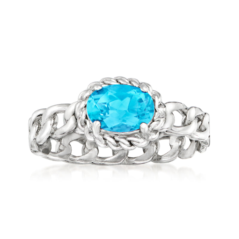 Sterling silver curb-link ring with oval blue topaz setting